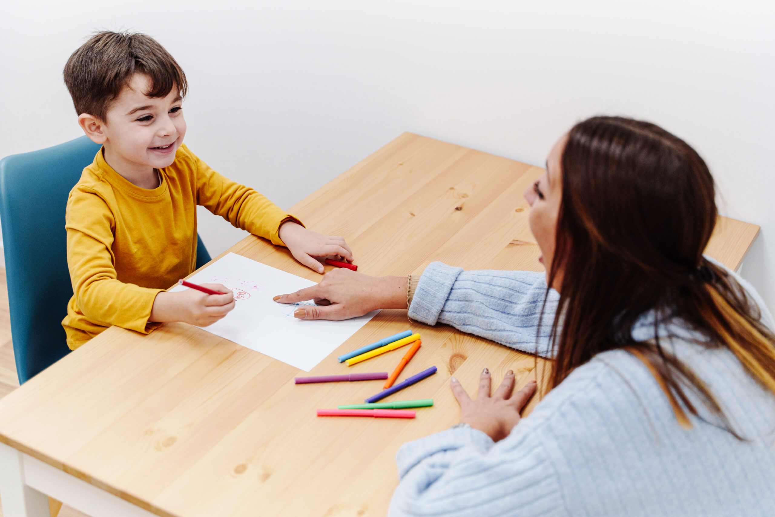 Registered behavior technician working with autistic client